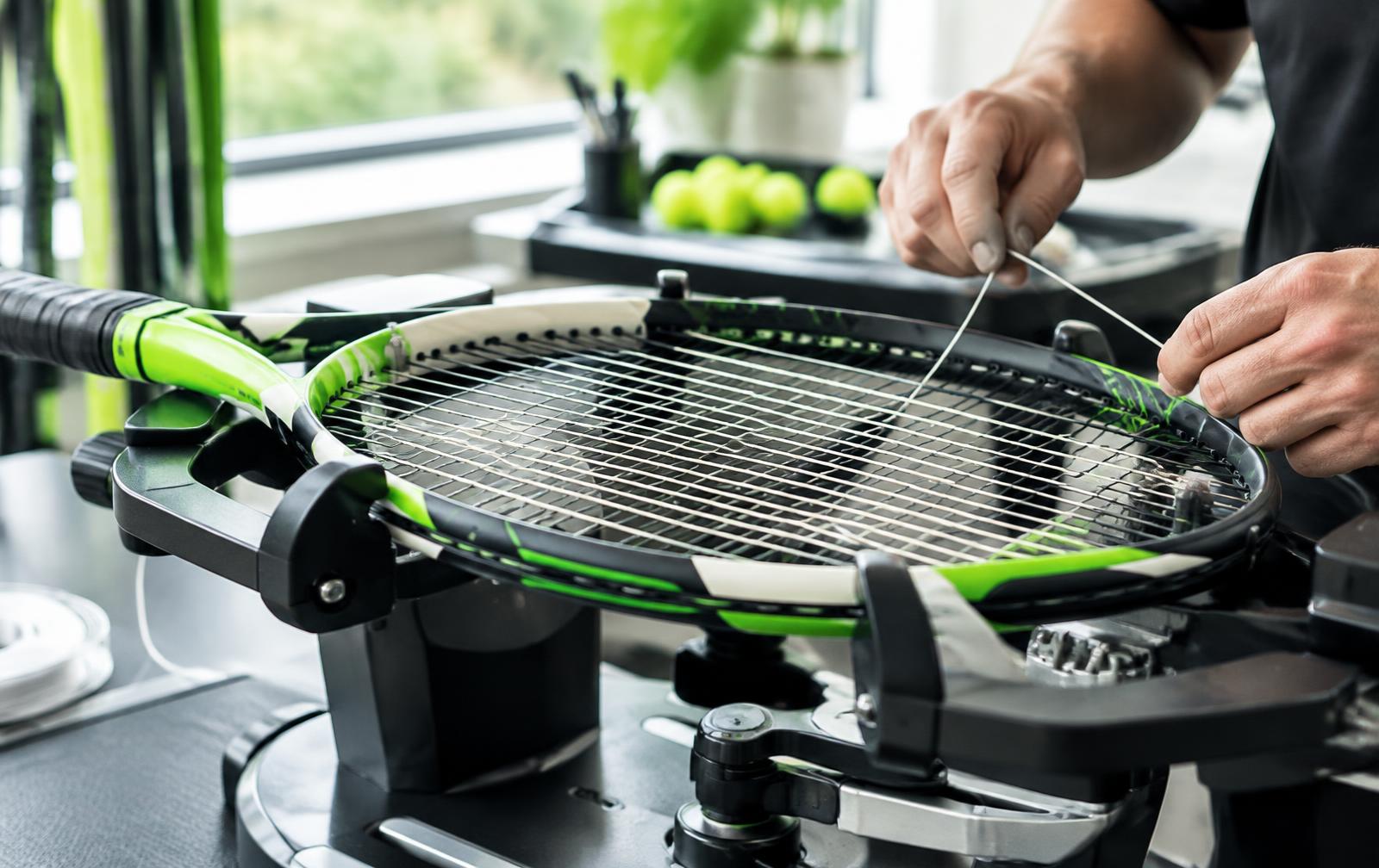 Professional racket stringing in progress